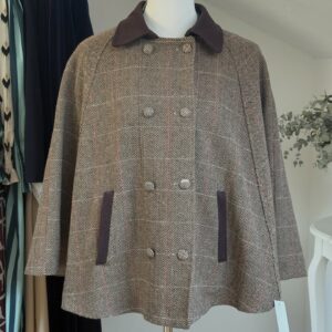 Capa de paño con bolsillos